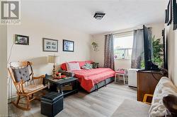 Bedroom featuring light wood-style flooring - 