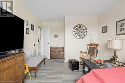 Bedroom featuring light wood finished floors - 