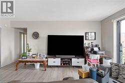 Living room with wood finished floors - 