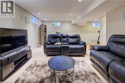 Living room featuring recessed lighting and plenty of natural light - 31 Bonfair Court, Kitchener, ON - Indoor