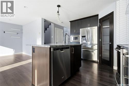 5669 Glide Crescent, Regina, SK - Indoor Photo Showing Kitchen With Stainless Steel Kitchen With Upgraded Kitchen