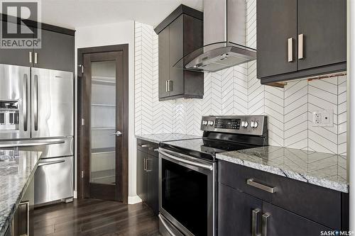 5669 Glide Crescent, Regina, SK - Indoor Photo Showing Kitchen With Stainless Steel Kitchen With Upgraded Kitchen