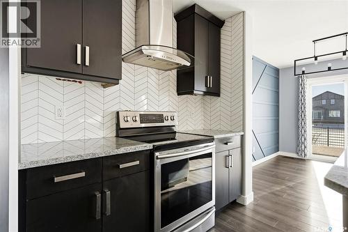 5669 Glide Crescent, Regina, SK - Indoor Photo Showing Kitchen With Upgraded Kitchen