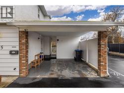 Carport with storage on interior and exterior - 