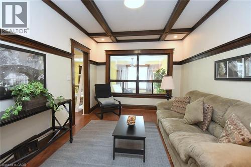 Living room with coffered ceiling, wood finished floors, and recessed lighting - 82 Somerset Avenue, Hamilton, ON - Indoor Photo Showing Living Room
