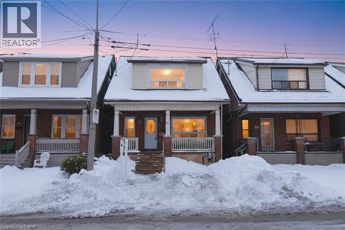 View of front of home featuring a porch and brick siding - 82 Somerset Avenue, Hamilton, ON - Outdoor With Deck Patio Veranda With Facade