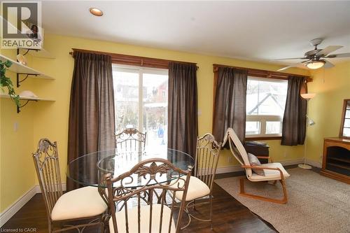 Dining space with dark wood-style flooring - 82 Somerset Avenue, Hamilton, ON - Indoor