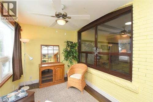 Family Room featuring ceiling fan and wood finished floors - 82 Somerset Avenue, Hamilton, ON - Indoor Photo Showing Other Room