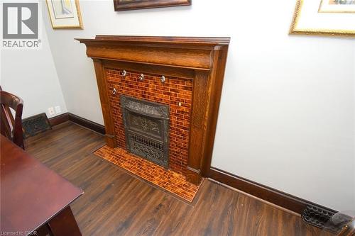 82 Somerset Avenue, Hamilton, ON - Indoor Photo Showing Other Room With Fireplace