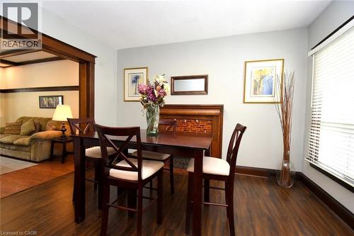 Dining space with dark wood-type flooring - 82 Somerset Avenue, Hamilton, ON - Indoor Photo Showing Dining Room