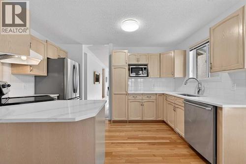 12 Sierra Morena Way Sw, Calgary, AB - Indoor Photo Showing Kitchen