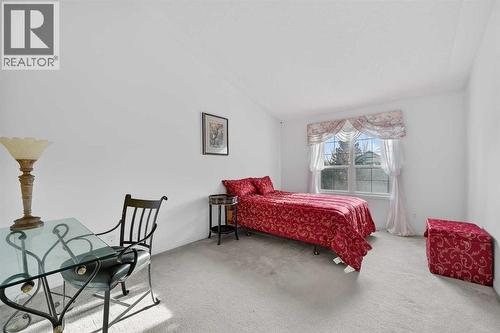 12 Sierra Morena Way Sw, Calgary, AB - Indoor Photo Showing Bedroom