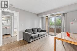 Living area featuring light wood-type flooring - 