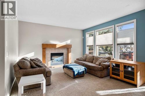 5 Mahogany Square Se, Calgary, AB - Indoor Photo Showing Living Room With Fireplace
