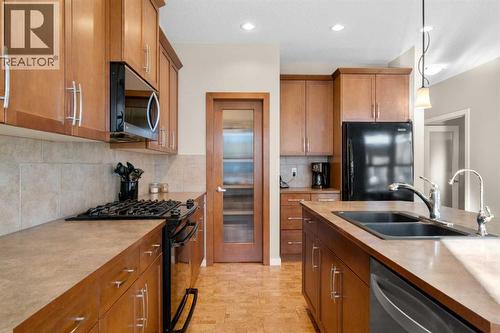 5 Mahogany Square Se, Calgary, AB - Indoor Photo Showing Kitchen With Double Sink