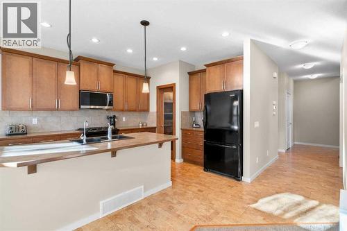 5 Mahogany Square Se, Calgary, AB - Indoor Photo Showing Kitchen With Double Sink