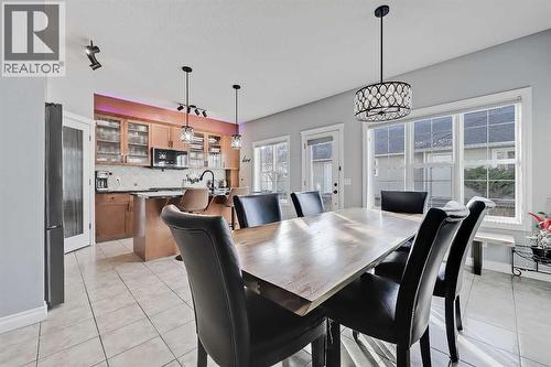 2959 Peacekeepers Way Sw, Calgary, AB - Indoor Photo Showing Dining Room