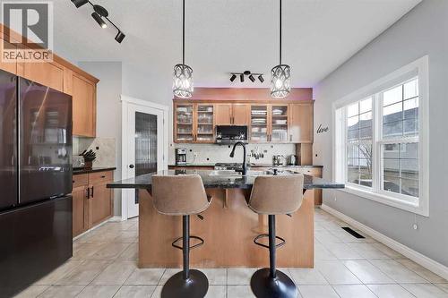 2959 Peacekeepers Way Sw, Calgary, AB - Indoor Photo Showing Kitchen With Stainless Steel Kitchen With Double Sink