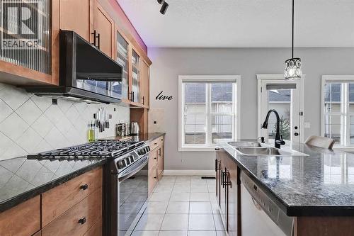 2959 Peacekeepers Way Sw, Calgary, AB - Indoor Photo Showing Kitchen With Double Sink With Upgraded Kitchen