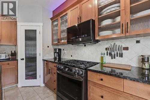 2959 Peacekeepers Way Sw, Calgary, AB - Indoor Photo Showing Kitchen