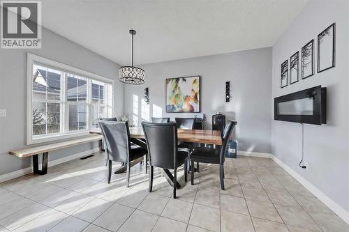 2959 Peacekeepers Way Sw, Calgary, AB - Indoor Photo Showing Dining Room