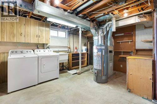 19 Carmangay Crescent Nw, Calgary, AB - Indoor Photo Showing Laundry Room