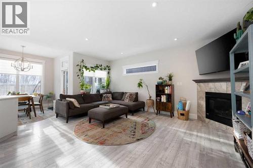 141 Pearson Drive, Fort Mcmurray, AB - Indoor Photo Showing Living Room With Fireplace