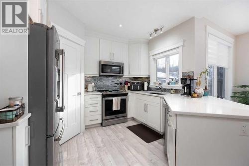141 Pearson Drive, Fort Mcmurray, AB - Indoor Photo Showing Kitchen With Stainless Steel Kitchen With Upgraded Kitchen