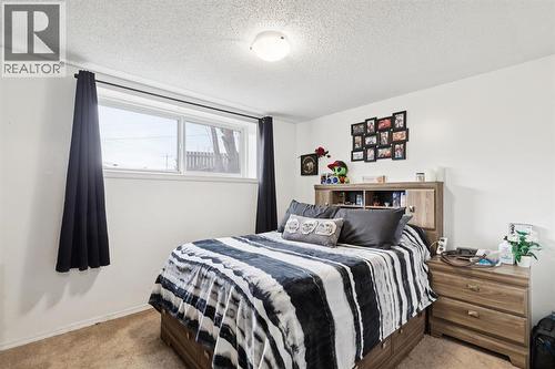 157 Penbrooke Close Se, Calgary, AB - Indoor Photo Showing Bedroom