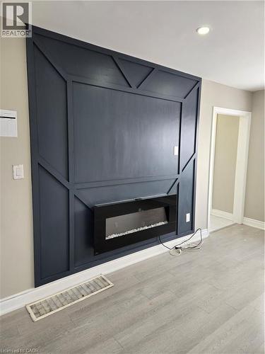 91 Barons Avenue S, Hamilton, ON - Indoor With Fireplace