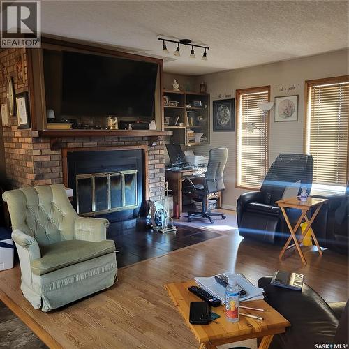 Kreklewich Acreage, Melville, SK - Indoor Photo Showing Living Room With Fireplace