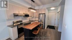 Kitchen With Newr S/S Appl. - 