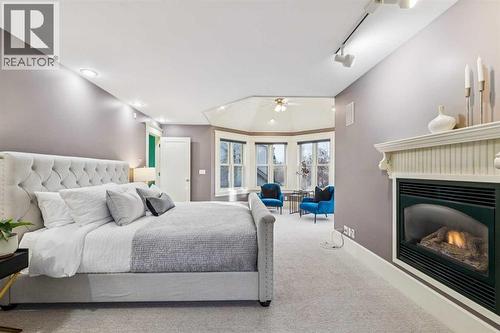 3019 6 Street Sw, Calgary, AB - Indoor Photo Showing Bedroom With Fireplace