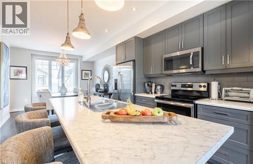 15 Pierre Trudeau Lane, Grimsby, ON - Indoor Photo Showing Kitchen With Stainless Steel Kitchen With Double Sink With Upgraded Kitchen