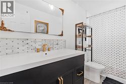 updated vanity, tile and toilet - 