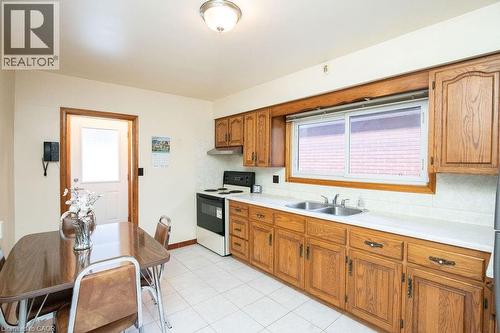 313 Barton Street W, Hamilton, ON - Indoor Photo Showing Kitchen With Double Sink