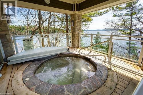 1869 Muskoka 118 Road W Unit# Btv-105, Bracebridge, ON - Outdoor With Body Of Water