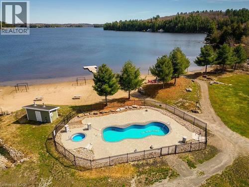 1869 Muskoka 118 Road W Unit# Btv-105, Bracebridge, ON - Outdoor With Body Of Water With In Ground Pool With View