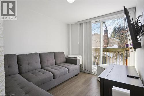 Living area featuring wood finished floors - 629 Burning Bush Road, Waterloo, ON - Indoor Photo Showing Living Room