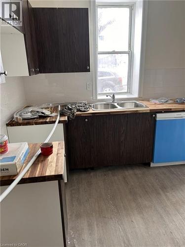33-35 E Wood Street E, Hamilton, ON - Indoor Photo Showing Kitchen With Double Sink