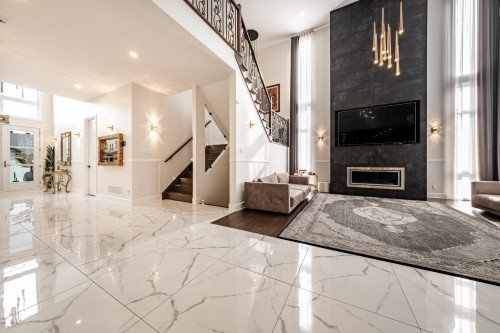 Staircase - 38 Rue De L'Oiselet, Carignan, QC - Indoor Photo Showing Other Room With Fireplace