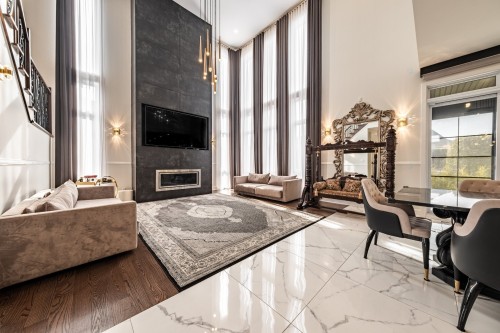 Living Room - 38 Rue De L'Oiselet, Carignan, QC - Indoor With Fireplace