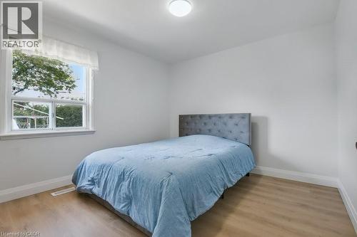 Bedroom featuring light wood-style flooring and baseboards - 111 Castlefield Drive, Hamilton, ON - Indoor Photo Showing Bedroom