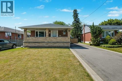 View of front of home with brick siding - 111 Castlefield Drive, Hamilton, ON - Outdoor With Deck Patio Veranda