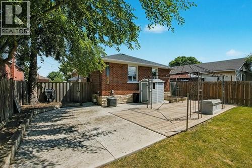 Rear view of property with a shed, brick siding, a gazebo, a patio, and a fenced backyard - 111 Castlefield Drive, Hamilton, ON - Outdoor