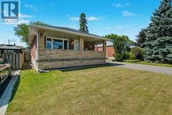 View of front of property featuring brick siding - 