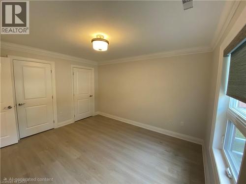 *Personal contents have been digitally removed* - 21 Bishop Sherlock Lane, Hamilton, ON - Indoor Photo Showing Other Room