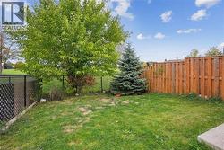 View of fenced backyard - 