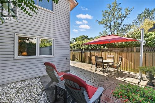 View of patio featuring outdoor dining space - 21 Arden Avenue, Hamilton, ON - Outdoor With Deck Patio Veranda