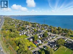 View of property location featuring nearby suburban area and a large body of water - 